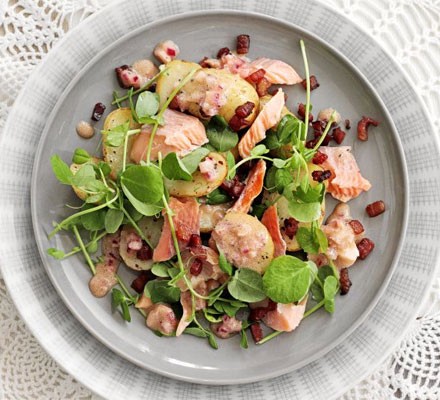 Hot smoked trout with pancetta, new potatoes and pea shoots