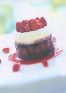 Hot strawberry soufflés with roasted almond ice-cream
