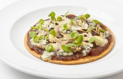 Hot turkey and caramelised onion tart with melting Stilton cheese