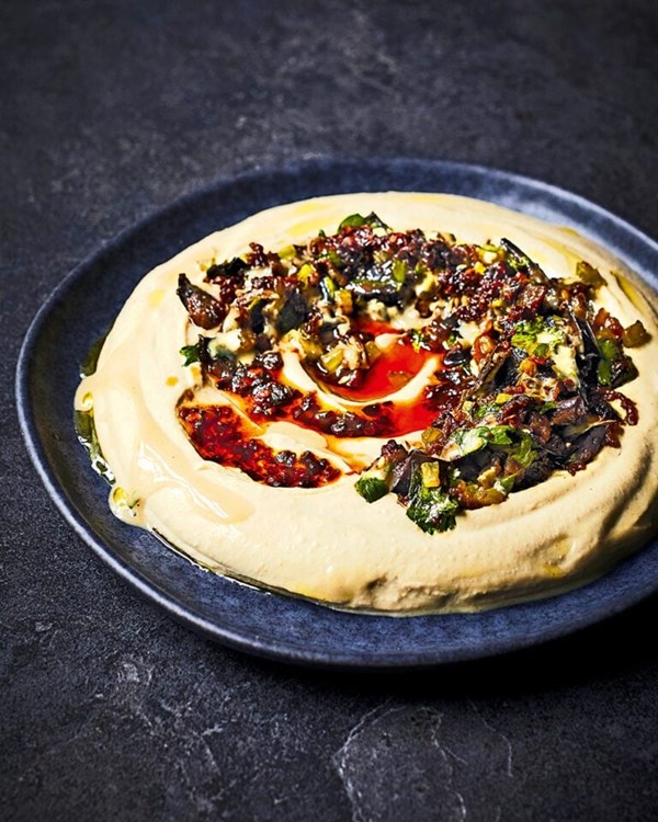Houmous with caramelised aubergine, pomegranate & chilli crisp