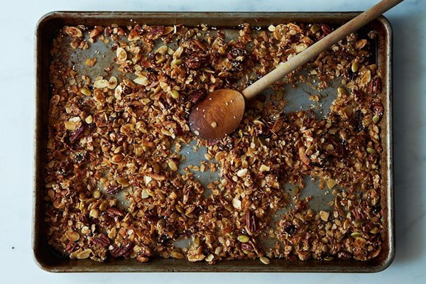 How to add dried fruit to granola before baking