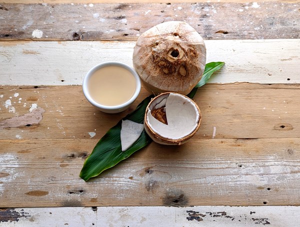 How to open a young coconut
