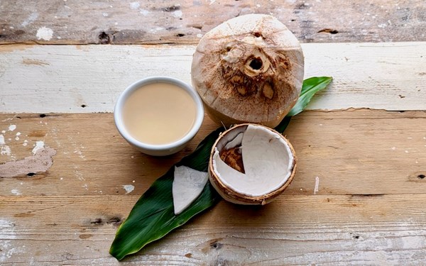 How to open a young coconut