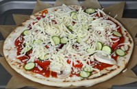 How to top a pizza