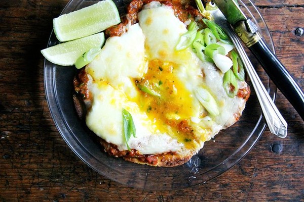 Huevos rancheros with blistered tomato salsa