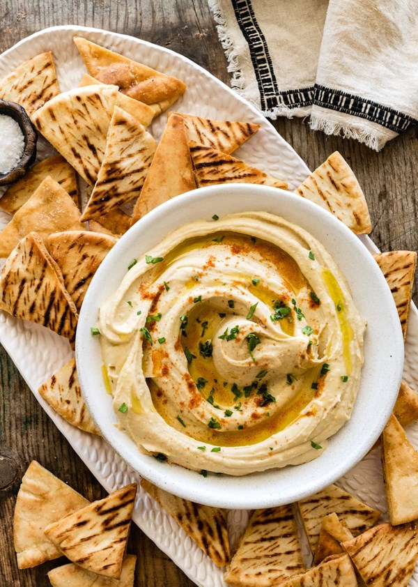 https://716f24d81edeb11608aa-99aa5ccfecf745e7cf976b37d172ce54.ssl.cf1.rackcdn.com/hummus-3127435l1.jpg