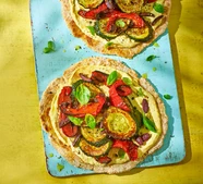 Hummus flatbread pizzas with roasted veg
