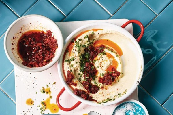 Hummus with harissa and chorizo oil