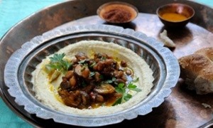 Hummus with hot mushrooms and beans