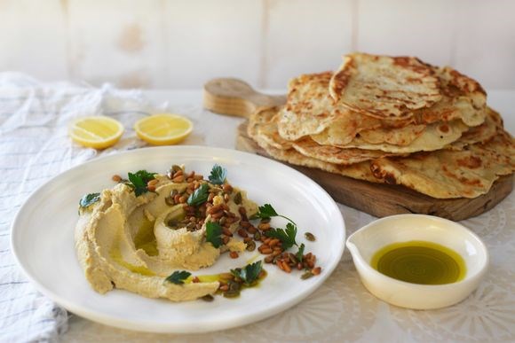 Hummus with roasted pumpkin seeds and pinenuts