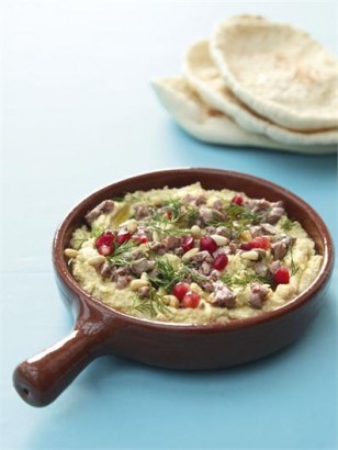 Hummus with seared lamb and toasted pine nuts