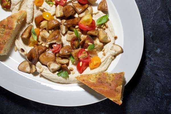 Hummus with seared shiitakes, tomato and basil