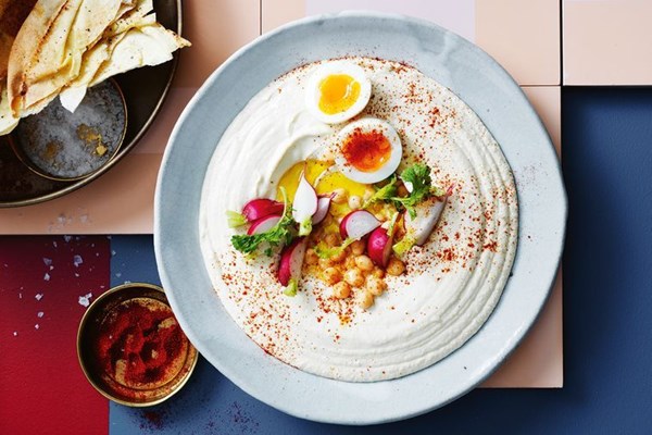 Hummus with soft-boiled egg and radishes