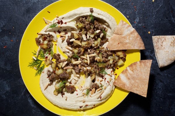 Hummus with spiced lamb, scallions and dill