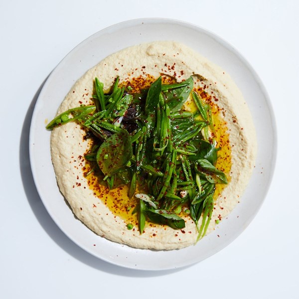 Hummus with sugar snap peas and basil