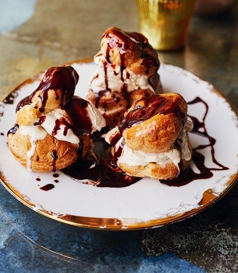 Ice cream profiterole sandwiches with salted chocolate sauce