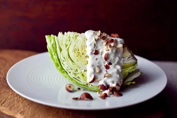 Iceberg lettuce with blue cheese dressing