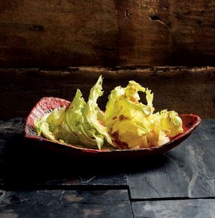 Iceberg salad with roasted onion and apple soy dressing