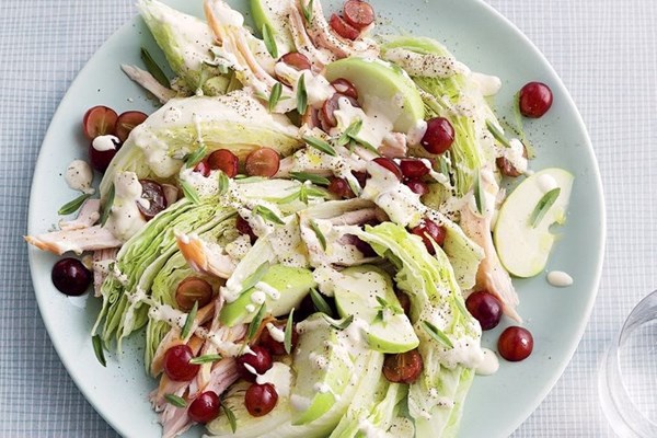 Iceberg wedge salad with blue cheese, grapes & smoked chicken