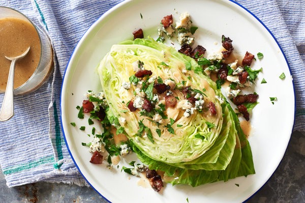 Iceberg wedge with warm bacon dressing and blue cheese