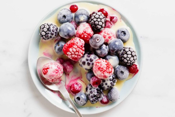 Iced berries with white chocolate sauce