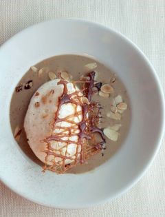 Île flottante with mocha crème Anglaise and nutmeg
