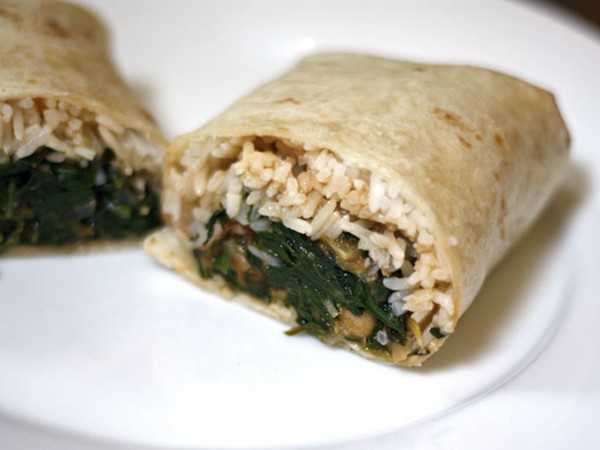 Indian burrito with spinach, chickpeas, and tomato