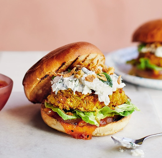 Indian spiced chickpea burgers with cauliflower raita + mango chutney
