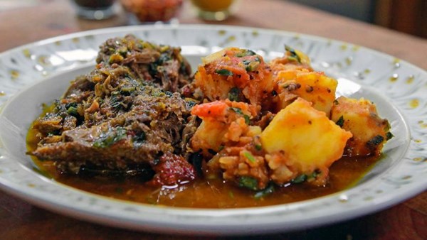 Indian-spiced lamb shoulder with Bombay potatoes
