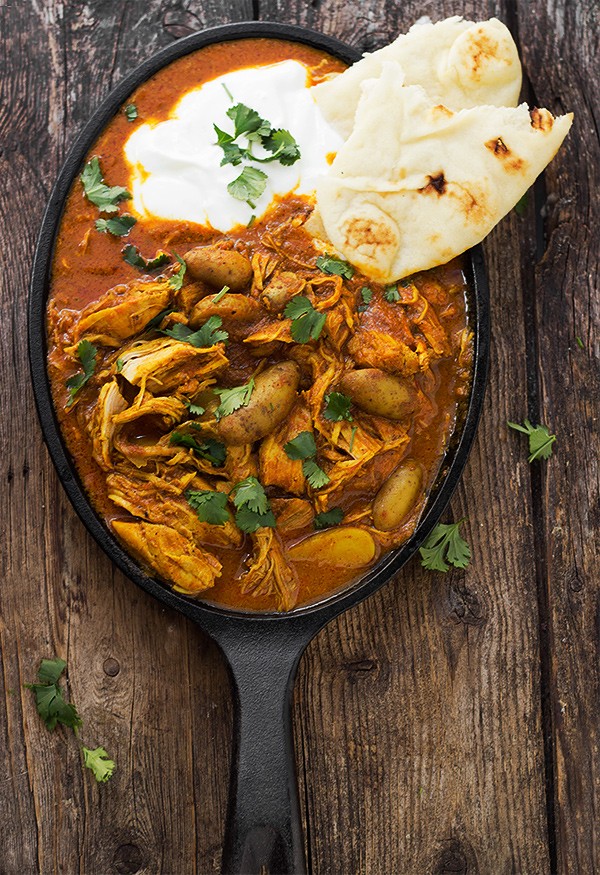 Indian spiced stew with chicken and potatoes in a tomato cream sauce