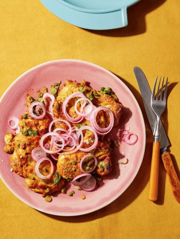 Indian spiced yogurt chicken with quick pickled onion and herbs