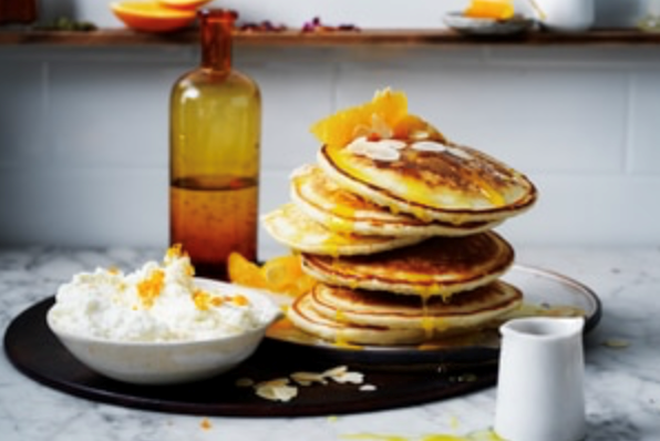 Indian-style fennel seed pancakes with whipped ricotta and oranges
