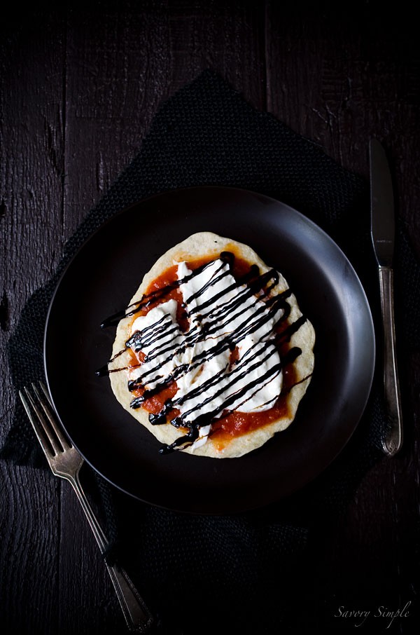 Individual pizzas with pomodoro, burrata and balsamic