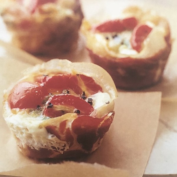 Individual prosciutto, spinach, and egg "pies"