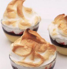 Individual queen of puddings with Morello cherry conserve