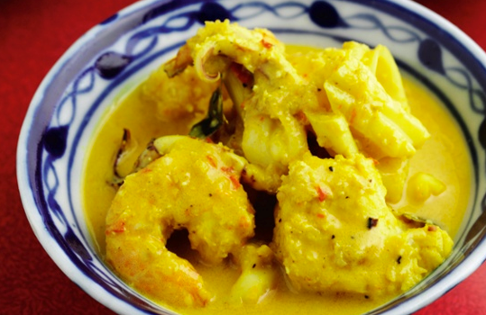 Indonesian seafood curry with monkfish, squid and prawns
