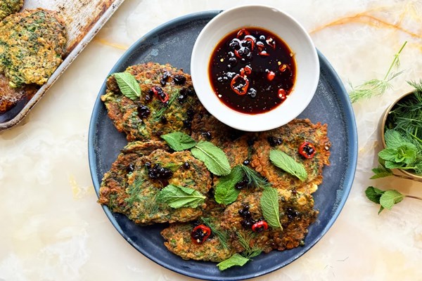 Iranian herb fritters with barberry dipping sauce