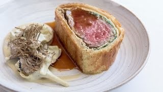 Irish beef Wellington with warm baby artichokes and a truffle vinaigrette