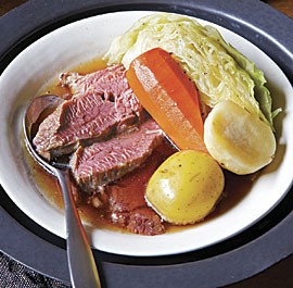 Irish corned beef and vegetables with dill pickle-horseradish cream and Guinness-mustard sauce