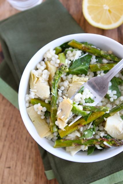 Israeli couscous salad with roasted asparagus, artichokes, and spinach