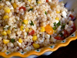 Israeli couscous with fresh corn, tomatoes, and feta