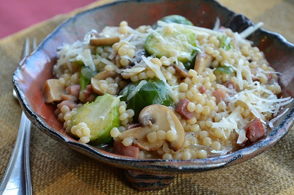 Israeli couscous with ham, mushrooms, and Brussels sprouts