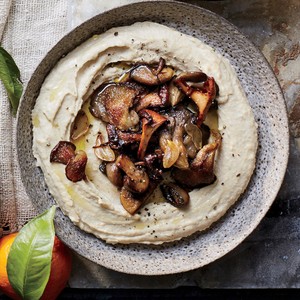 Israeli-style hummus with sautéed mushrooms with garlic