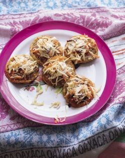Isthmus-style crispy thin masa cakes with finely ground beef and pickled cabbage (Garnachas Istmeñas)