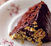 Italian Christmas chocolate cake with chestnuts, hazelnuts, and walnuts
