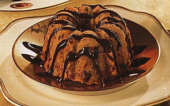 Italian fruitcakes with Frangelico chocolate sauce