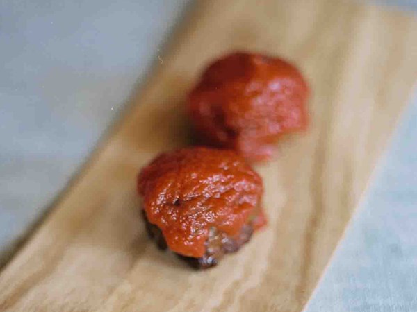 Italian meatballs in caper-tomato sauce