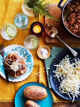 Jacket potatoes with Bolognese and cheese