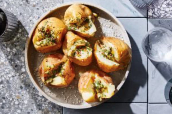 Jacket potatoes with confit garlic and chilli herb butter