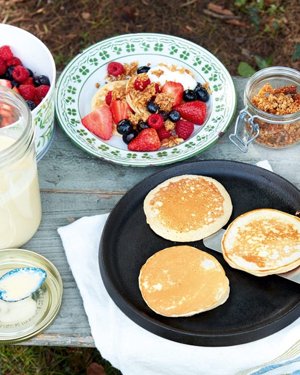 'Jam jar' pancakes with berries and crumbled flapjacks